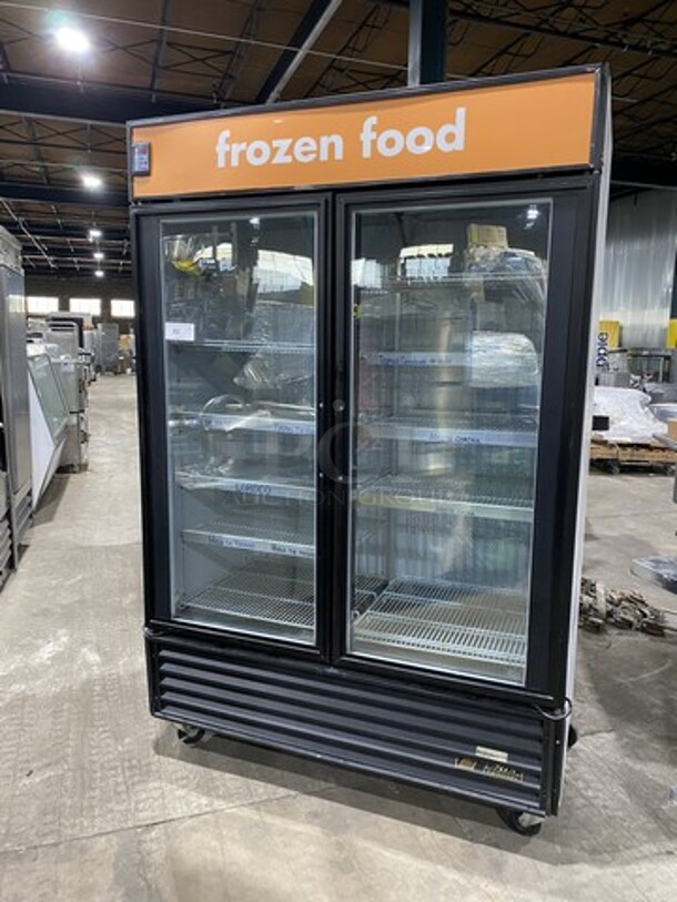 True 2 Glass Door Reach In Freezer Merchandiser! With Poly Coated Racks! Model GDM49F Serial 4974277! 115/208/230 1Phase! On Commercial Casters! 