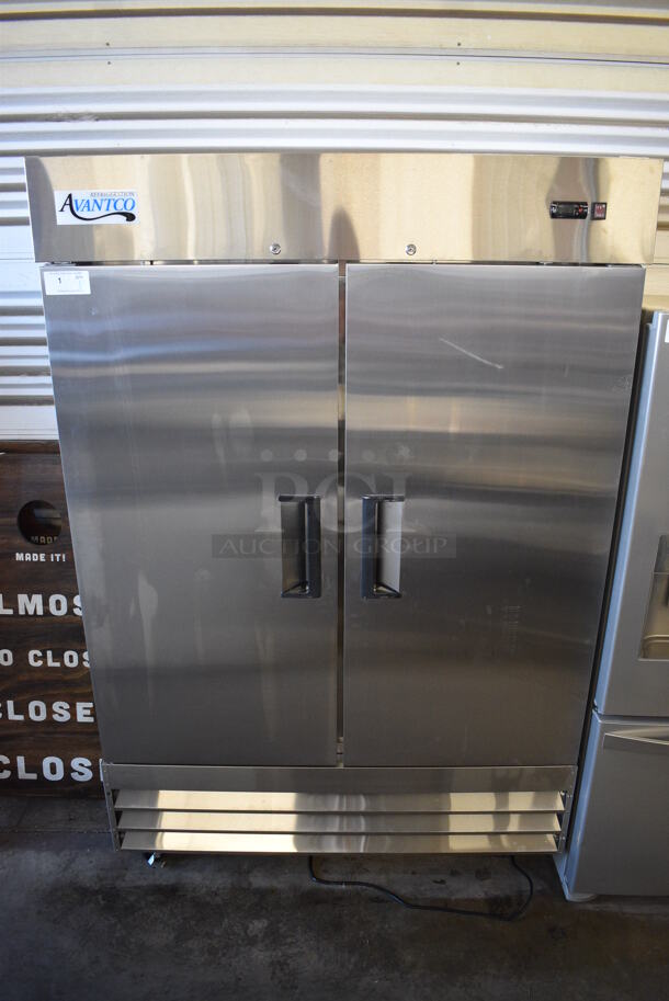 BRAND NEW SCRATCH AND DENT! Avantco Model 178A49RHC Stainless Steel Commercial Two Door Reach In Cooler w/ Poly Coated Racks on Commercial Casters. 115 Volts, 1 Phase. 53x33x83. Tested and Working!