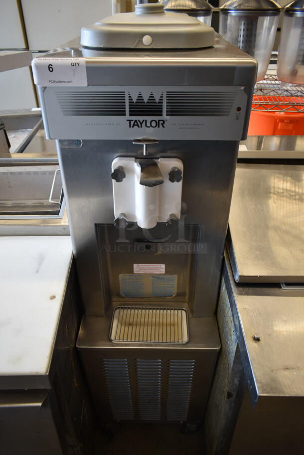 2015 Taylor 358-27 Stainless Steel Commercial Floor Style Air Cooled Single Flavor Soft Serve Ice Cream Machine on Commercial Casters. 208-230 Volts, 1 Phase.