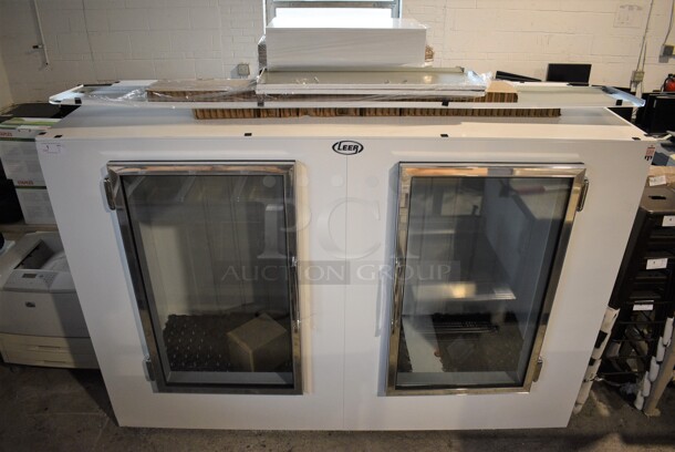 BRAND NEW SCRATCH AND DENT! 2022 Leer L100UAGP Metal Commercial Bagged Ice Freezer Merchandiser. Front Glass on Left Side Is Missing. 115 Volts, 1 Phase. 94x39x78. Tested and Working!