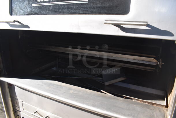 H. Ruiz 106 Stainless Steel Commercial Floor Style Wood Fired Grilled Chicken Rotisserie Oven on Commercial Casters. 59x38x66 - Image 4 of 11