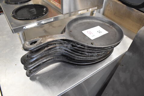 10 Cast Iron Skillets. 15.5x7.5x1. 10 Times Your Bid!