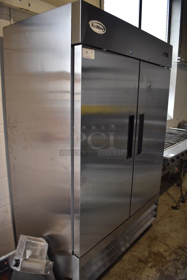 BRAND NEW SCRATCH AND DENT! KoolMore RIR-2D-SS Stainless Steel Commercial 2 Door Reach In Cooler w/ Poly Coated Racks on Commercial Casters. 115 Volts, 1 Phase. 54x32.5x83. Tested and Working! - Image 2 of 8