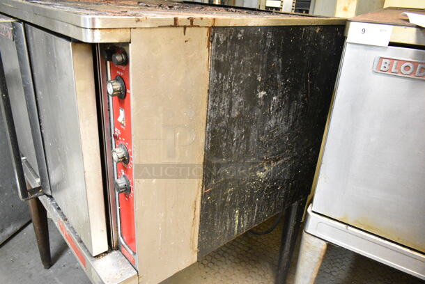 Blodgett Mark V Stainless Steel Commercial Electric Powered Full Size Convection Oven w/ Solid Doors, Metal Oven Racks and Thermostatic Controls on Metal Legs. This Unit Was In Working Condition When the Restaurant Closed. (kitchen) - Image 7 of 9