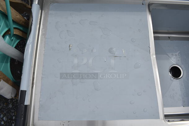 BRAND NEW SCRATCH AND DENT! Regency 600S1242424L 50 1/2" 16 Gauge Stainless Steel One Compartment Commercial Sink with Stainless Steel Legs, Cross Bracing, and 1 Drainboard - 24" x 24" x 14" Bowl. No Legs.  - Image 5 of 6