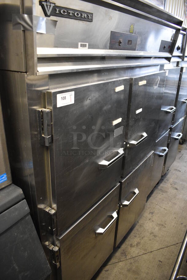 Victory Stainless Steel Commercial 4 Half Size Door Reach In Cooler on Commercial Casters. 58x36x84. Tested and Powers On But Does Not Get Cold