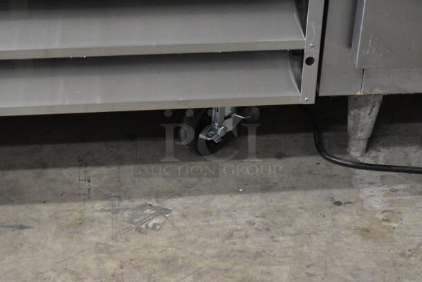 BRAND NEW SCRATCH AND DENT! 2023 KoolMore RIR-2D-GD Stainless Steel Commercial 2 Door Cooler Merchandiser w/ Poly Coated Racks on Commercial Casters. 115 Volts, 1 Phase. Tested and Working! - Image 5 of 9