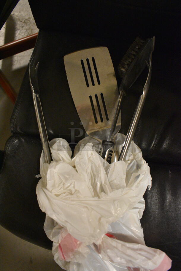 ALL ONE MONEY! Tier Lot of Various Items Including Plastic Containers, GIARC Handheld Flastloader, 2010 Audi License Plate Holder, and Grill Utensil Set - Image 7 of 7