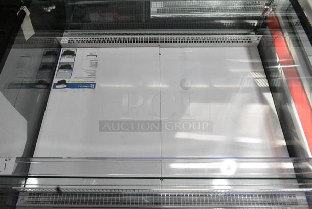 BRAND NEW SCRATCH AND DENT! Econocold OM-IRSSCG Metal Commercial Floor Style Self Contained Island Fridge Curved Glass on Commercial Casters. 115 Volts, 1 Phase. Tested and Working! - Image 3 of 5