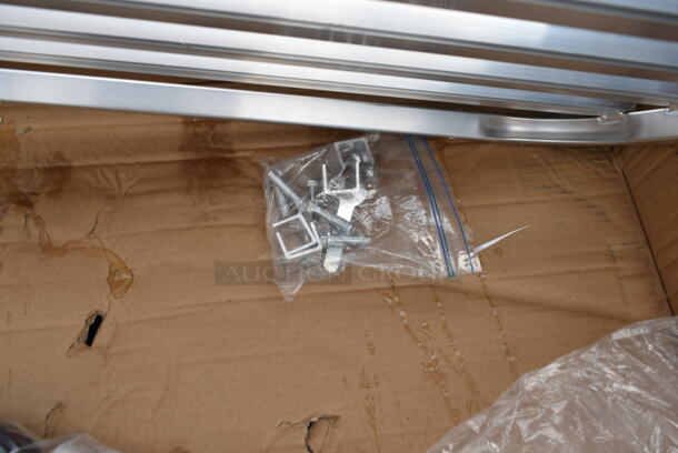 BRAND NEW SCRATCH AND DENT! Regency 600PR103K 10 Pan End Load Half Height Bun / Sheet Pan Rack - Unassembled - Image 3 of 7