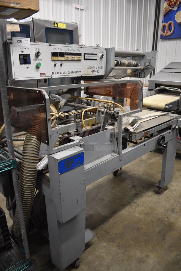 Hanagata Model HP-10 Metal Commercial Floor Style Automatic L Sealer on Commercial Casters. 200 Volts, 3 Phase. 66x36x56 - Image 1 of 11