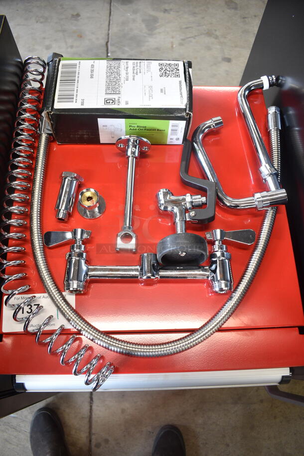 BRAND NEW SCRATCH AND DENT! Lot of Regency 600PRA Pre-Rinse Add-On Faucet Base, Handles and Spray Nozzle Attachment.  - Image 1 of 8