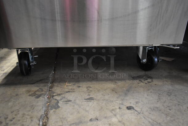BRAND NEW SCRATCH AND DENT! 2023 Avantco 178APT27HC Stainless Steel Commercial Sandwich Salad Prep Table Bain Marie Mega Top on Commercial Casters. 115 Volts, 1 Phase. Tested and Working! - Image 5 of 8