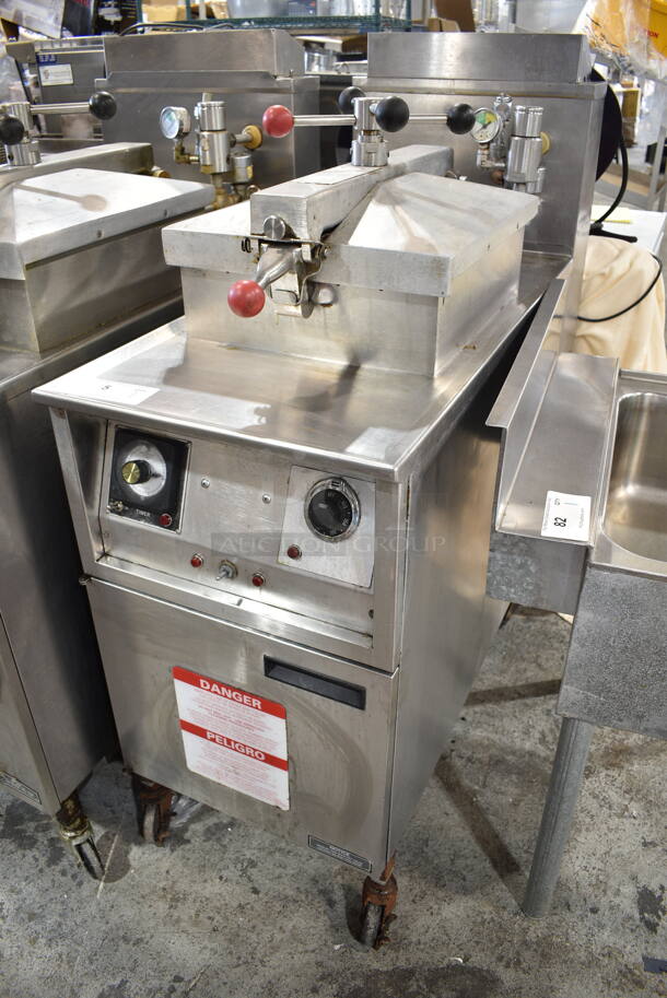Henny Penny 600RB Stainless Steel Commercial Floor Style Natural Gas Powered Pressure Fryer w/ Metal Fry Basket on Commercial Casters. 80,000 BTU.  - Image 2 of 10