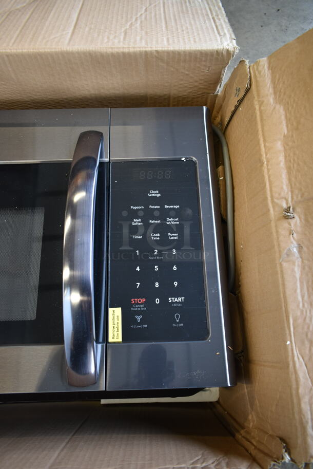 BRAND NEW SCRATCH AND DENT! Frigidaire FFMV1645TD Metal Microwave Oven.  - Image 3 of 5