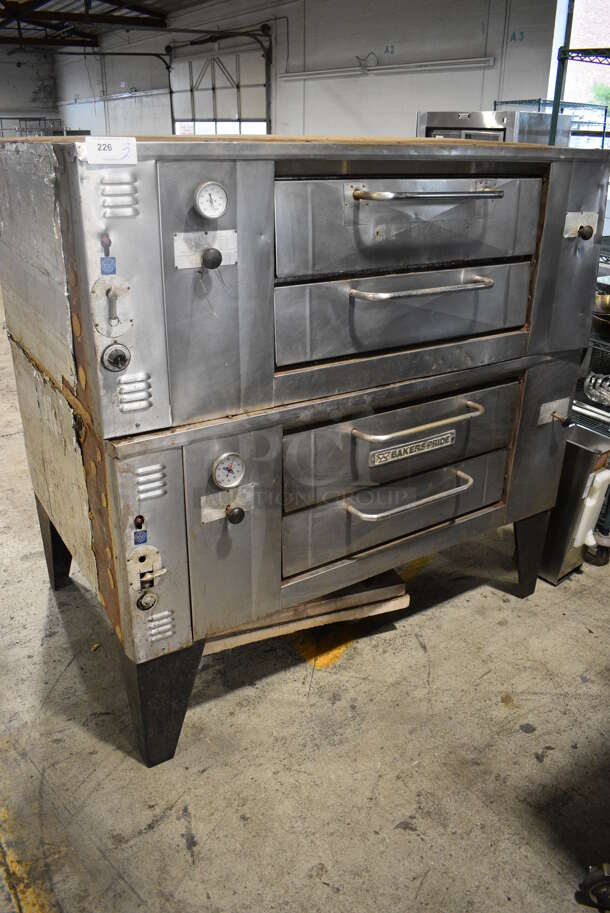 2 Bakers Pride Stainless Steel Commercial Natural Gas Powered Single Deck Pizza Oven on Metal Legs. Comes w/ Pizza Cooking Stones. 65x43x66. 2 Times Your Bid!
