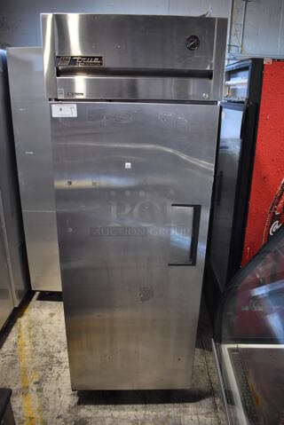 2011 True TG1R-1S Stainless Steel Commercial Single Door Reach In Cooler w/ Poly Coated Racks on Commercial Casters. 115 Volts, 1 Phase. 29x35x83. Tested and Working!