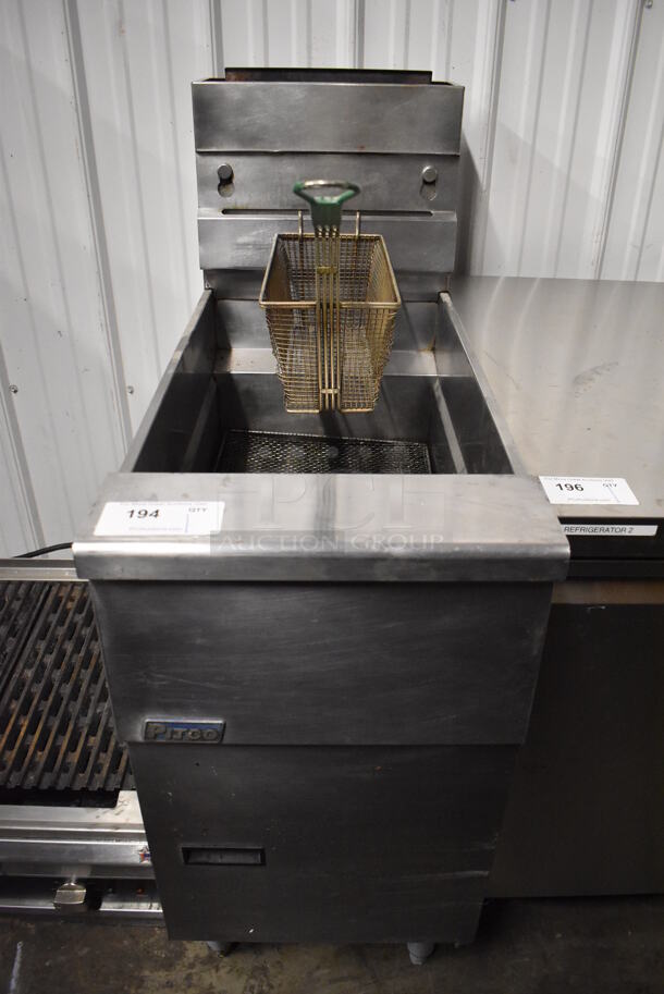 2016 Pitco Frialator SG14 Stainless Steel Commercial Floor Style Natural Gas Powered Deep Fat Fryer w/ 1 Metal Fry Basket. 110,000 BTU. 16x34x45.5