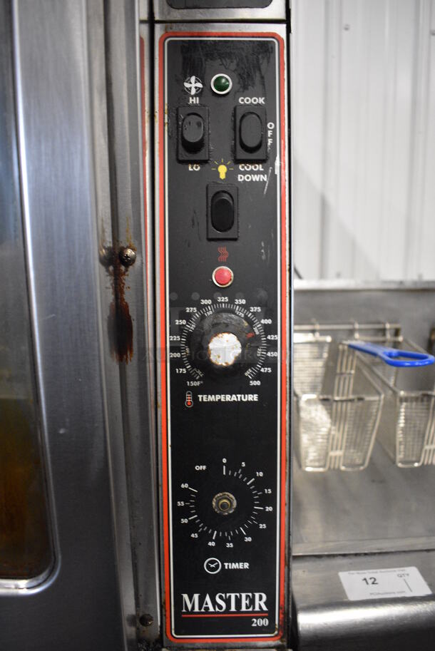 2 Garland Master 200 Stainless Steel Commercial Natural Gas Powered Full Size Convection Ovens w/ View Through Doors, Metal Oven Racks and Thermostatic Controls on Commercial Casters. 38x45.5x68. 2 Times Your Bid! - Image 5 of 7