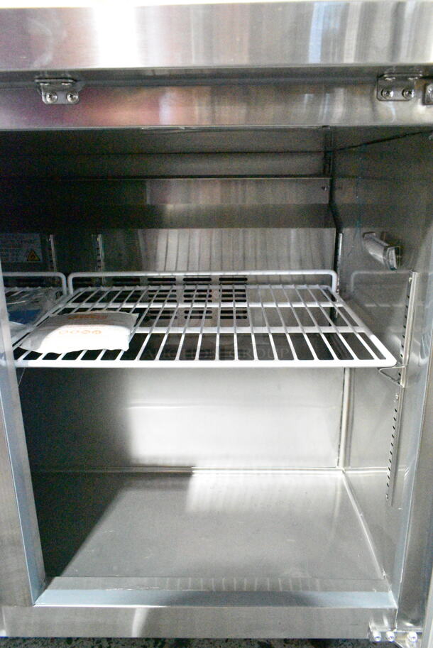 BRAND NEW SCRATCH AND DENT! 2024 Avantco 178SSWT48RHC Stainless Steel 48" Two Door Worktop Refrigerator with 3 1/2" Backsplash on Commercial Casters. 115 Volts, 1 Phase. Tested and Working! - Image 5 of 8