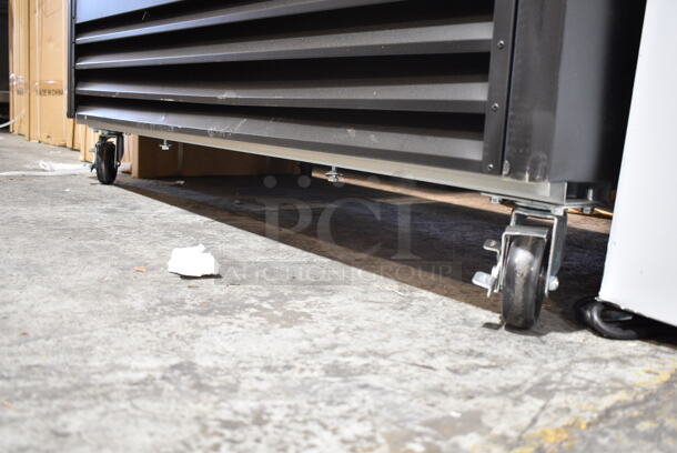 BRAND NEW SCRATCH AND DENT! 2023 Avantco 178GDS47HCB Metal Commercial 2 Door Reach In Cooler Merchandiser w/ Poly Coated Racks on Commercial Casters. 120 Volts, 1 Phase. Tested and Working! - Image 4 of 7