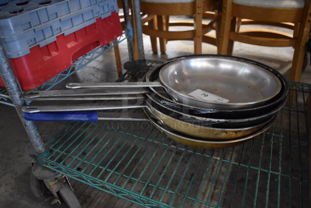 5 Various Metal Skillets. Includes 21.5x12.5x2. 5 Times Your Bid!