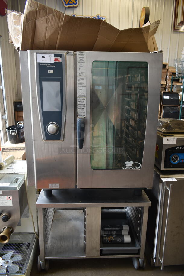 2013 Rational SCC WE 101G Stainless Steel Commercial Countertop Natural Gas Powered Combitherm Convection Oven on Equipment Stand w/ Commercial Casters. 75,800-83,500 BTU.