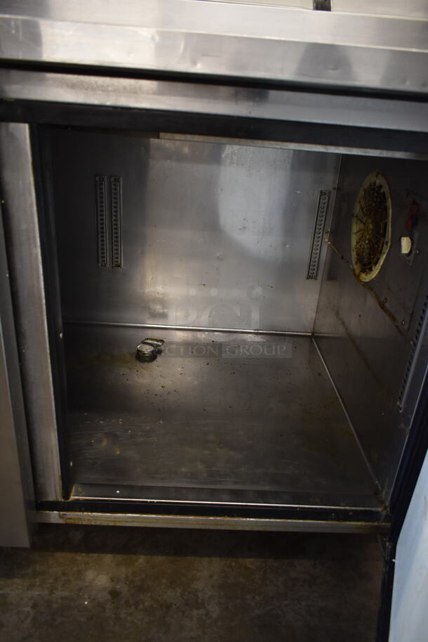Turbo Air TPR-67SD Stainless Steel Commercial Pizza Prep Table on Commercial Casters. 115 Volts, 1 Phase. Tested and Powers On But Does Not Get Cold
 - Image 8 of 8