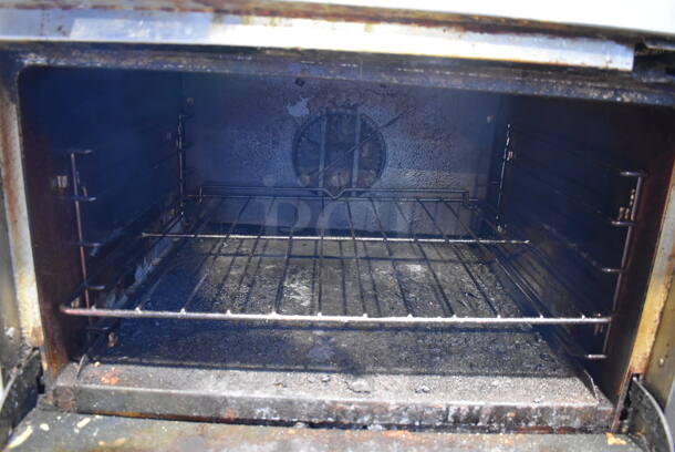 Southbend Select Stainless Steel Commercial Natural Gas Powered 6 Burner Range w/ Flat Top Griddle, Convection Oven, Oven, Over Shelf and Back Splash on Commercial Castesr. 61x35x60 - Image 8 of 9