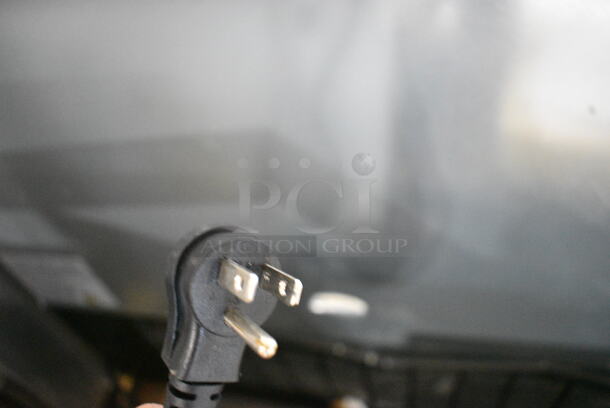 BRAND NEW SCRATCH AND DENT! KoolMore RIR-3D-SS Stainless Steel Commercial 3 Door Reach In Cooler w/ Poly Coated Racks on Commercial Casters. 115 Volts, 1 Phase. Tested and Working! - Image 9 of 11