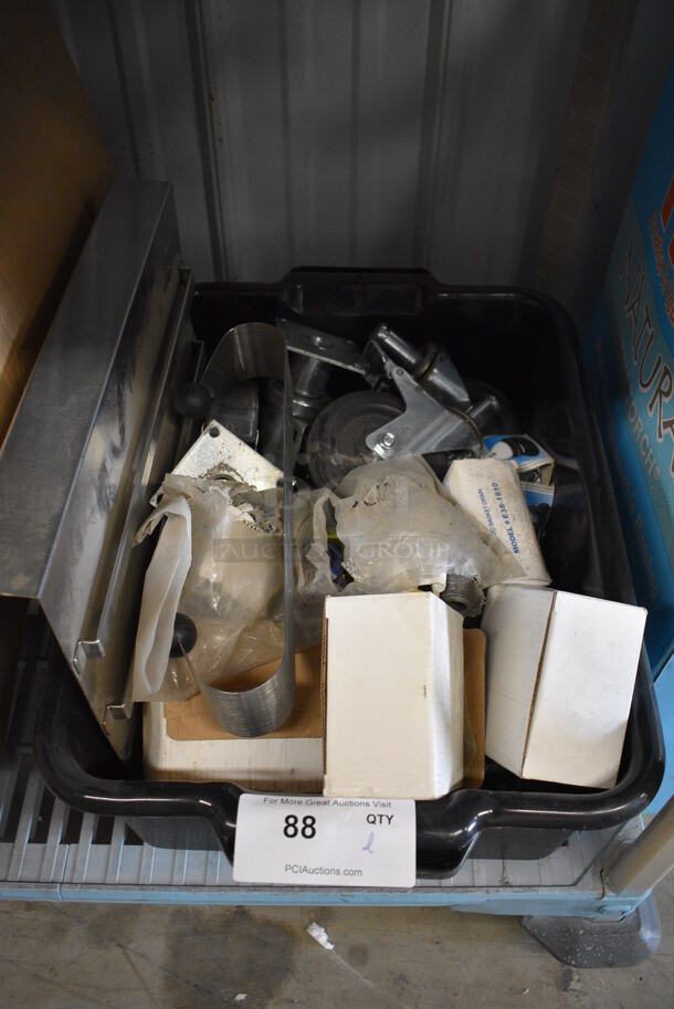 ALL ONE MONEY! Lot of Various BRAND NEW Items Including Casters, Sink Drains and Shelf in Black Poly Bus Bin