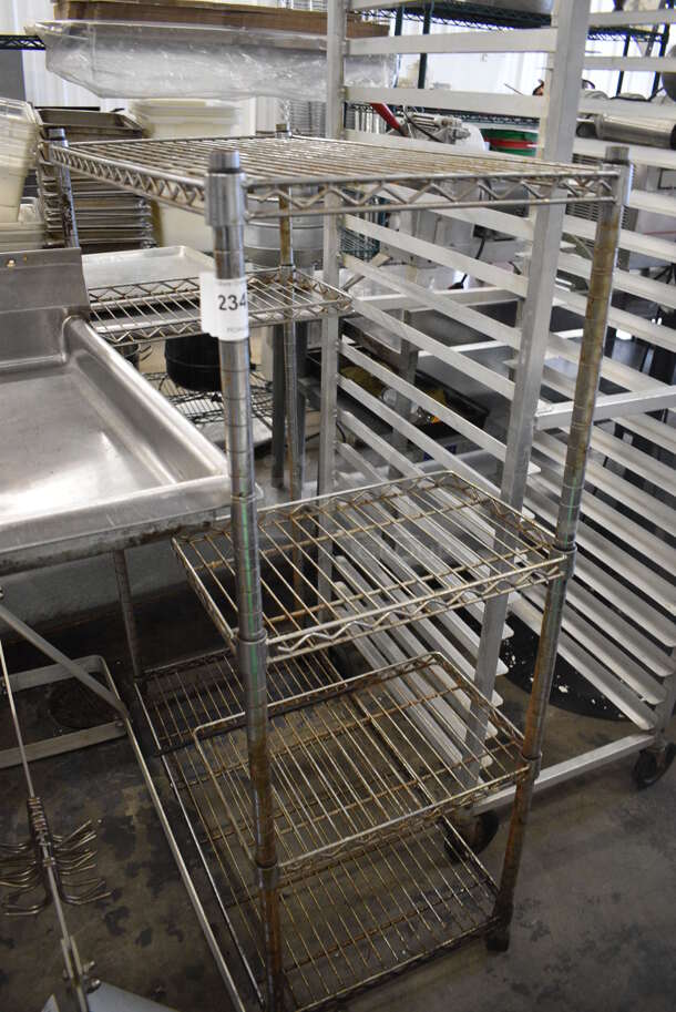 Chrome Finish Shelving Unit w/ 2 Whole Shelves and 3 Partial Shelves. BUYER MUST DISMANTLE. PCI CANNOT DISMANTLE FOR SHIPPING. PLEASE CONSIDER FREIGHT CHARGES. 36x18x53