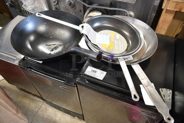 4 LIKE NEW! Items; 407SEW1030 Vollrath N7012 Arkadia 12" Aluminum Non-Stick Fry Pan, 407EW1030 Vollrath 7012 Arkadia 12" Aluminum Fry Pan, 980062008 Matfer Bourgeat 062008 15 3/4" Black Carbon Steel Fry Pan. 4 Times Your Bid! - Image 1 of 10