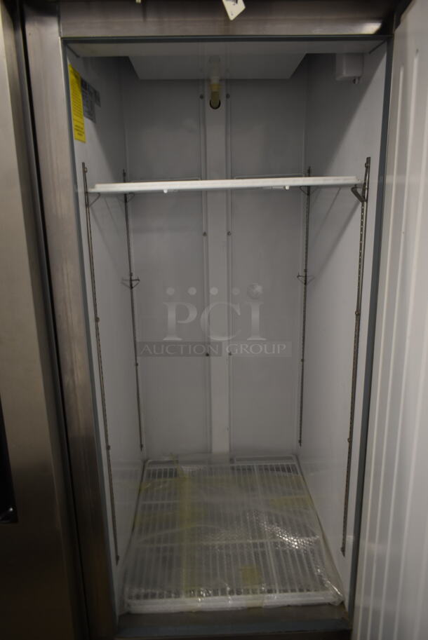 Arctic Air AF23 Stainless Steel Commercial Single Door Reach In Freezer w/ Poly Coated Racks on Commercial Casters. 115 Volts, 1 Phase. Tested and Working! - Image 4 of 5