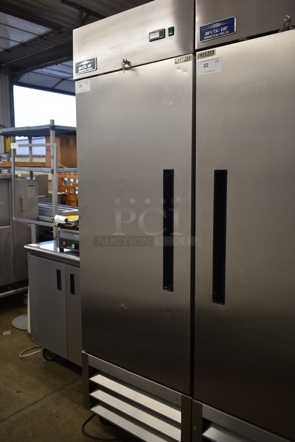 Arctic Air AF23 Stainless Steel Commercial Single Door Reach In Freezer w/ Poly Coated Racks on Commercial Casters. 115 Volts, 1 Phase. Tested and Working!