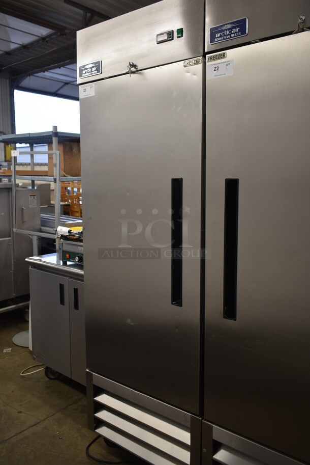 Arctic Air AF23 Stainless Steel Commercial Single Door Reach In Freezer w/ Poly Coated Racks on Commercial Casters. 115 Volts, 1 Phase. Tested and Working! - Image 1 of 6