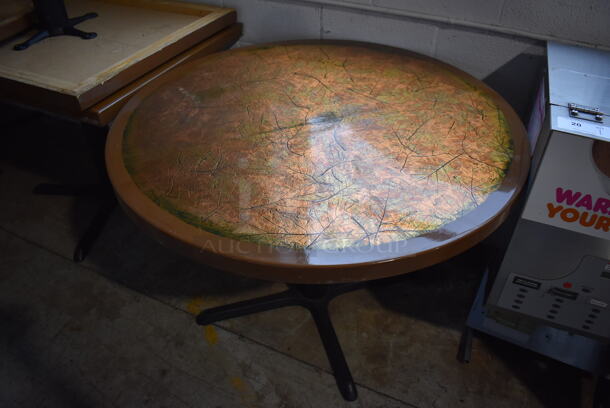 2 Leaf Patterned Round Tabletop on Black Metal Table Base. 42x42x29. 2 Times Your Bid!