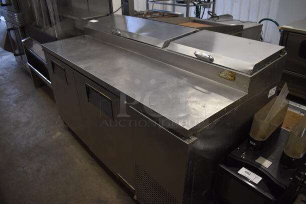 True TPP-67 Stainless Steel Commercial Pizza Prep Table on Commercial Casters. 115 Volts, 1 Phase. 67x32x42. Tested and Powers On But Does Not Get Cold