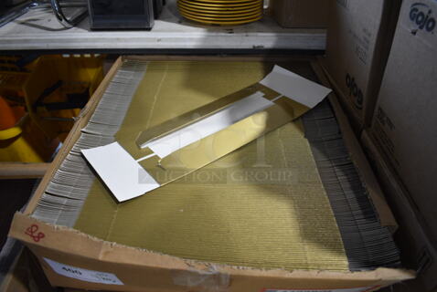 4 Boxes of Gold Colored Box Pieces. 4 Times Your Bid!