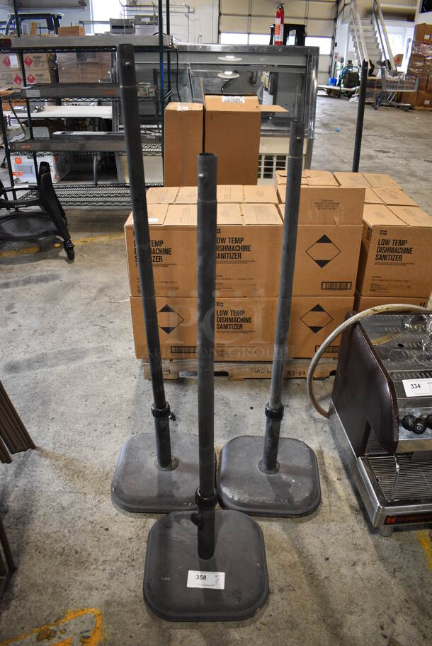 3 Black Floor Style Patio Umbrella Stands. 14x14x47, 14x14x54. 3 Times Your Bid!