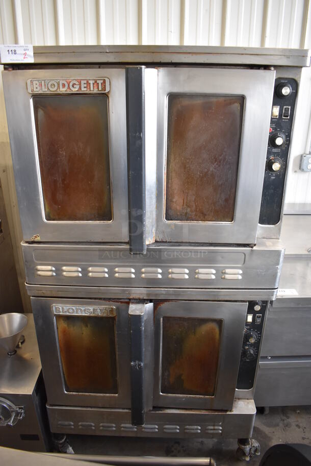 2 Blodgett Stainless Steel Commercial Natural Gas Powered Full Size Convection Ovens w/ View Through Doors, Metal Oven Racks and Thermostatic Controls on Commercial Casters. 38x40x73. 2 Times Your Bid!