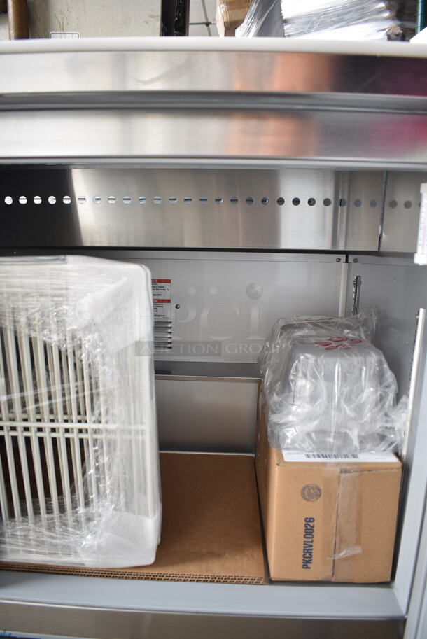 BRAND NEW SCRATCH AND DENT! Beverage Air SPE60HC-10 Stainless Steel Commercial Elite Series 60" 2 Door Refrigerated Sandwich Prep Table on Commercial Casters. 115 Volts, 1 Phase. Tested and Working! - Image 5 of 12