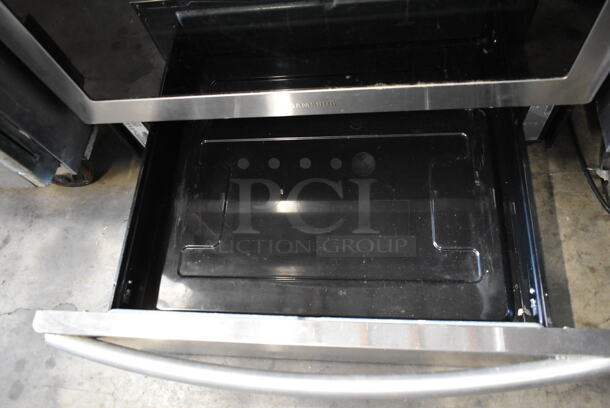 Samsung Stainless Steel Natural Gas Powered 4 Burner Range w/ Oven. - Image 7 of 10