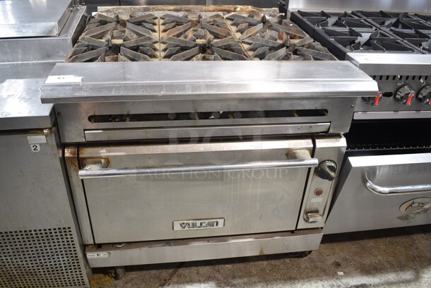 Vulcan V6B36S Stainless Steel Commercial Natural Gas Powered 6 Burner Range w/ Oven on Commercial Casters.  - Image 1 of 6