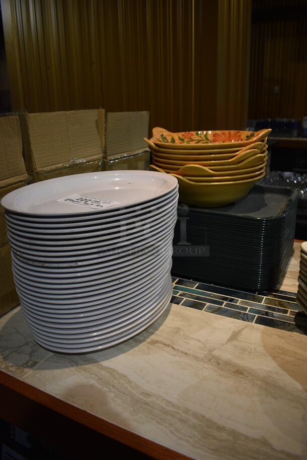 ALL ONE MONEY! Lot of 27 White Oval Poly Plates, 7 Yellow Poly Bowls and 30 Green Trays. Includes 13x9.5x1. (bar) - Image 2 of 6