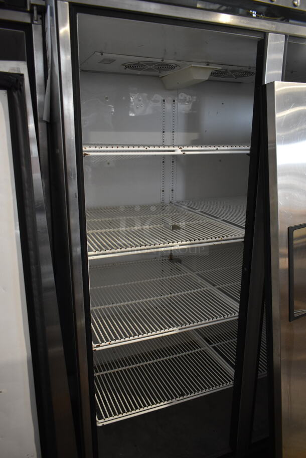 2012 True TG2R-2S ENERGY STAR Stainless Steel Commercial 2 Door Reach In Cooler w/ Poly Coated Racks on Commercial Casters. Doors Need To Be Reattached. 115 Volts, 1 Phase. Tested and Working! - Image 4 of 8