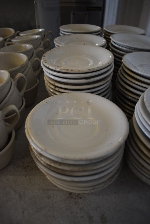 46 White Ceramic Saucers. 6x6x1. 46 Times Your Bid!