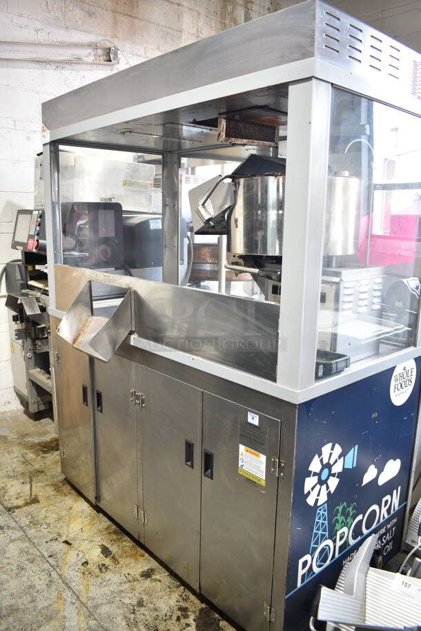 Gold Medal 2229EDS Stainless Steel Commercial Floor Style Popcorn Machine and Merchandiser. 120/208-240 Volts.  - Image 1 of 10