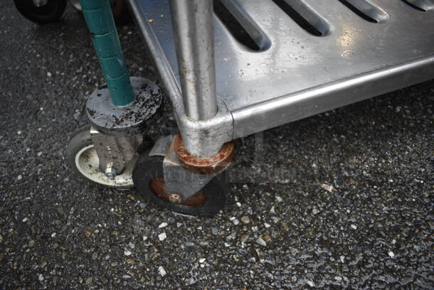 Metal 4 Tier Shelving Unit on Commercial Casters. BUYER MUST DISMANTLE. PCI CANNOT DISMANTLE FOR SHIPPING. PLEASE CONSIDER FREIGHT CHARGES. 48x24x69 - Image 5 of 5