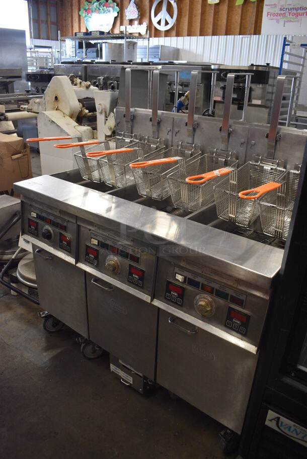 Keating Model 14TFMRI Stainless Steel Commercial Floor Style Natural Gas Powered 3 Bay Instant Recovery Deep Fat Fryer w/ Filtration System and 6 Metal Fry Baskets on Commercial Casters. 46x31.5x55 - Image 2 of 12